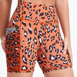 Fabletics Power Hold On-The-Go High Waisted 6” Orange Leopard Print Bike Shorts